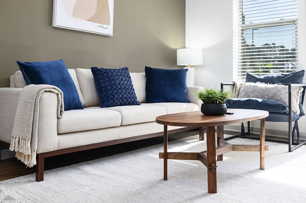 a living room with a couch and a table