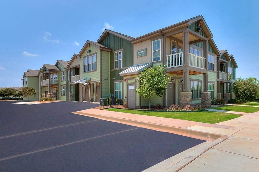 a row of houses on the side of a street