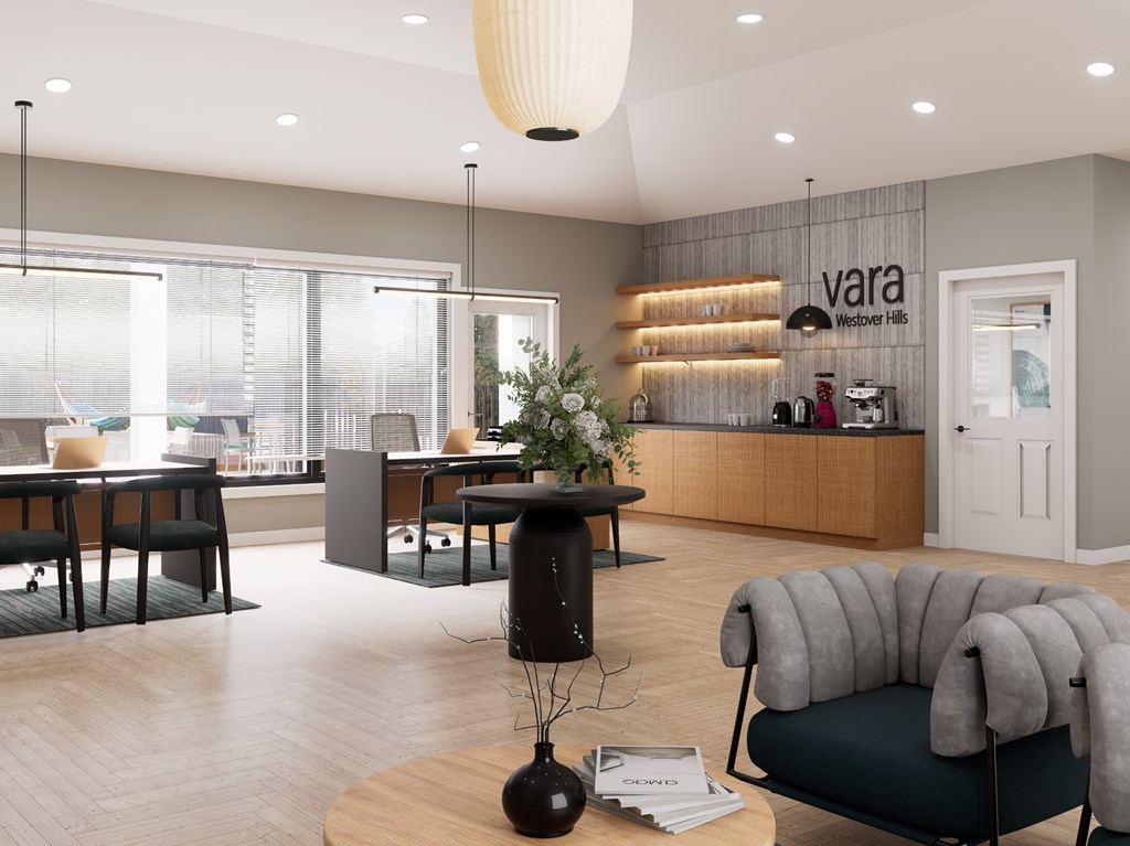 A modern living room with a grey sofa and a wooden coffee table.