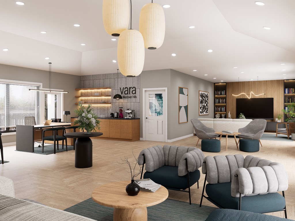 A modern living room with a grey sofa and a wooden coffee table.