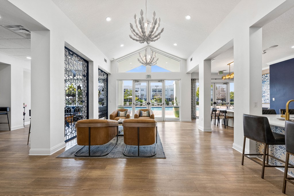 club house area with couches and a table with chairs