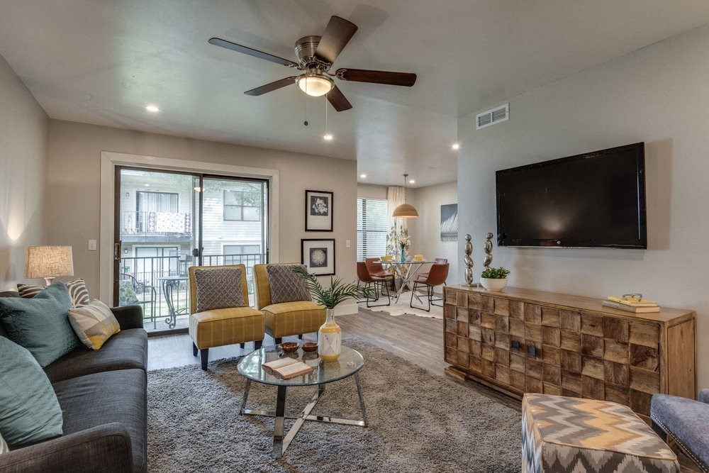 a living room with a couch and a tv