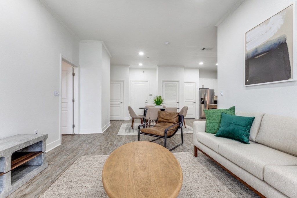 a living room with a couch and a table
