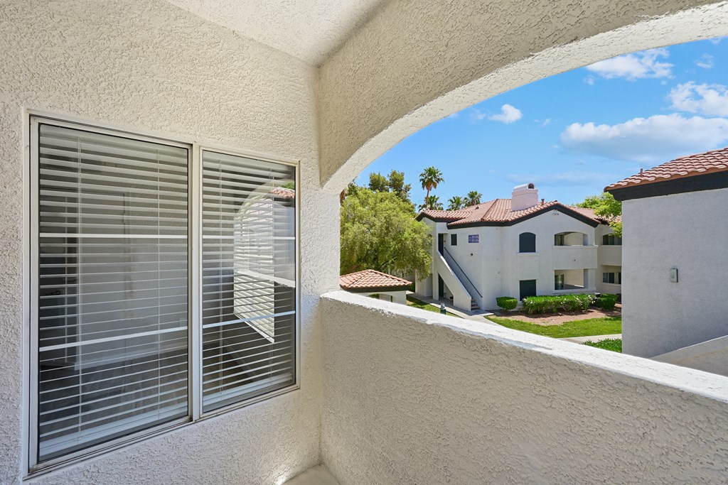 a view of the backyard from the balcony