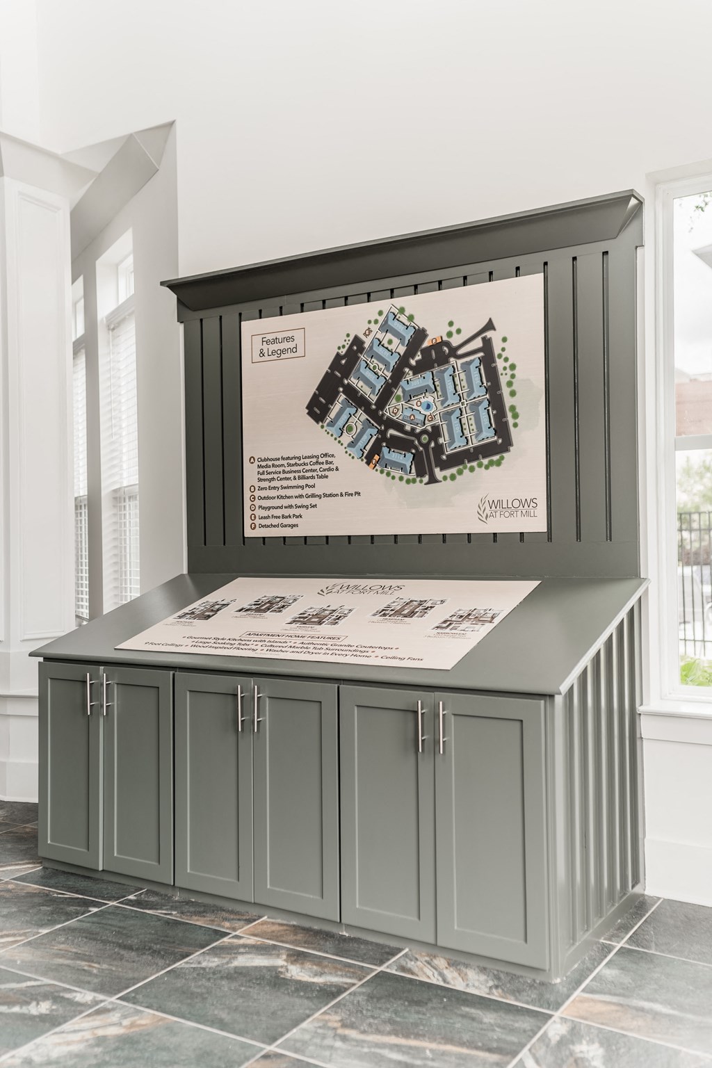 the island in the center of the living room with a poster on it