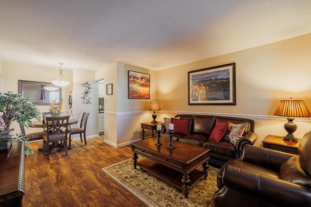 a living room with couches and a coffee table