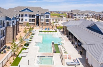 exterior shot of sparkling pool in midland pet-friendly apartment - Photo Gallery 9