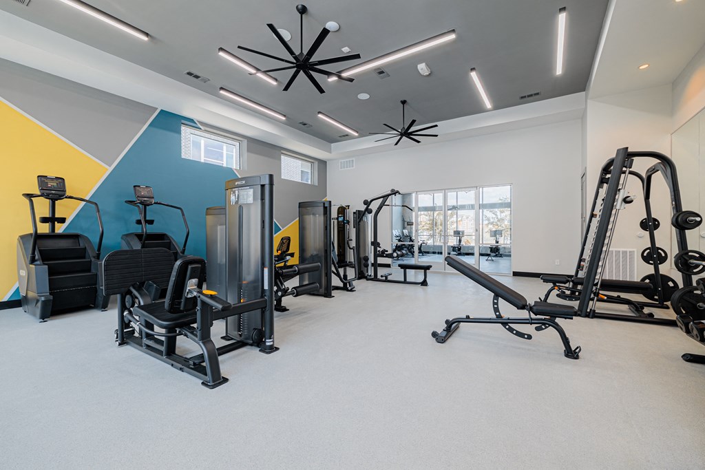 the gym at the enclave at woodbridge apartments in sugar land, tx