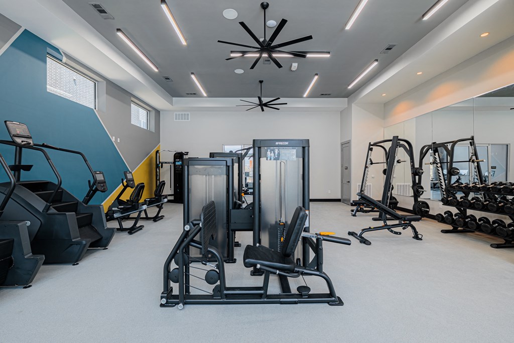 the gym at the enclave at woodbridge apartments in sugar land, tx