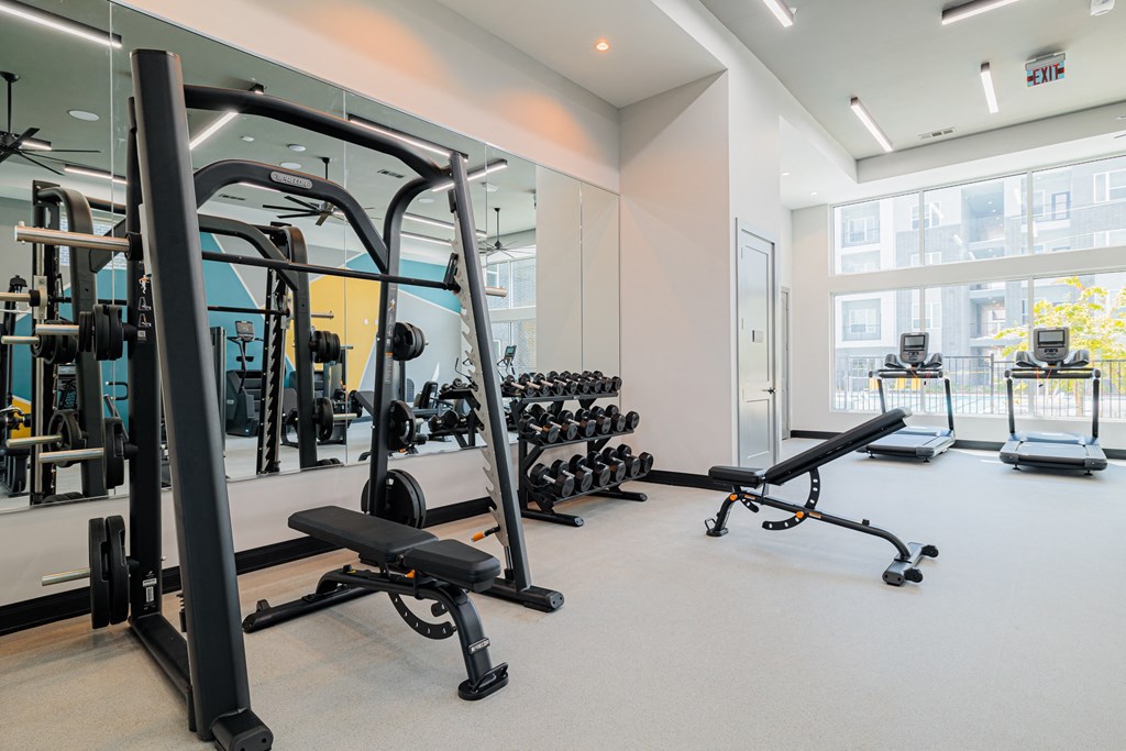 a gym with weights and other exercise equipment