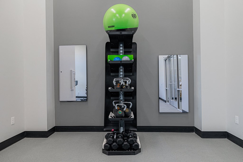 a robot with a green helmet on top