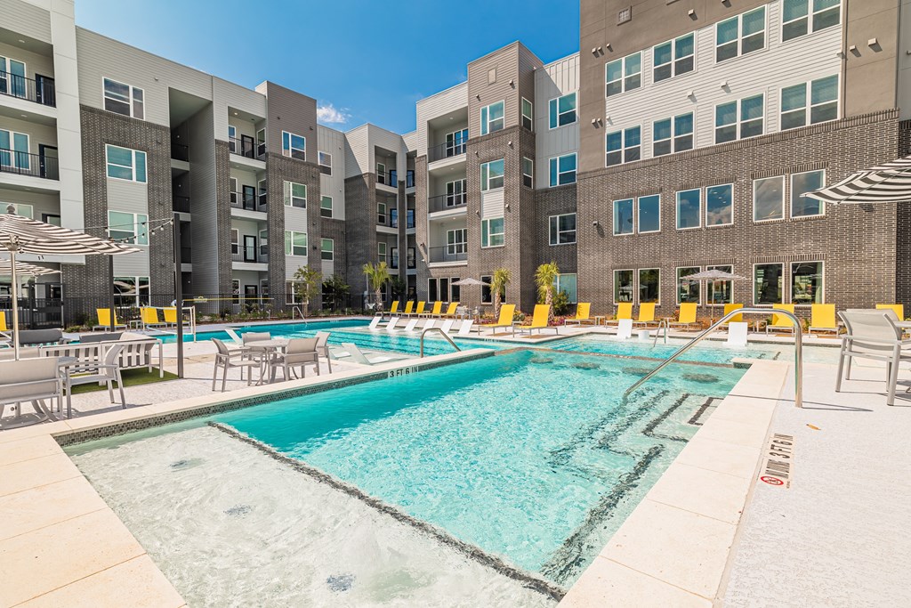 take a dip in the resort style pool at trillium apartments in fairfax
