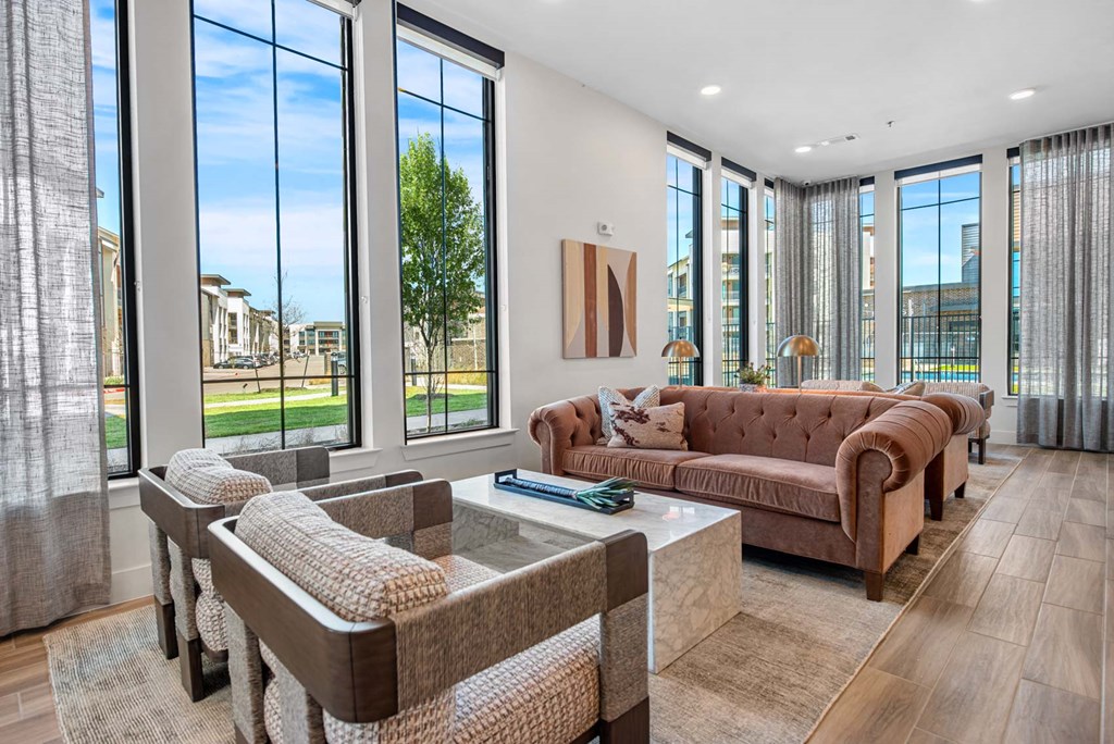a living room with couches and a coffee table