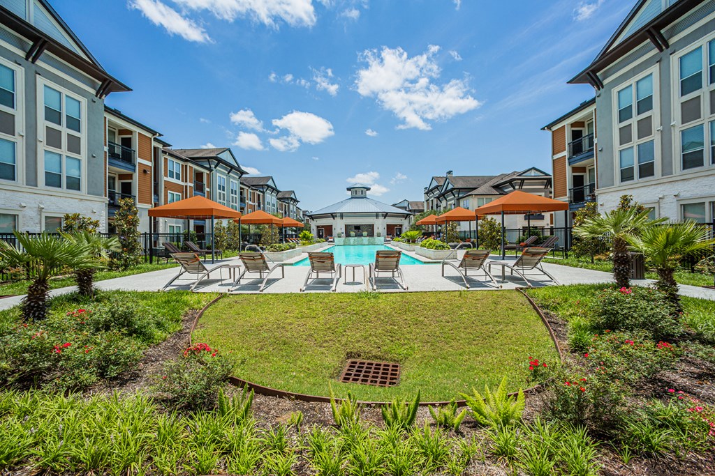 outdoor swimming pool with lounge areas