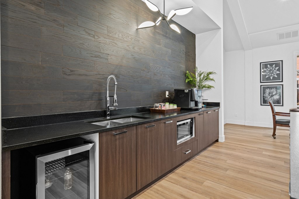 a kitchen with a sink and a counter top