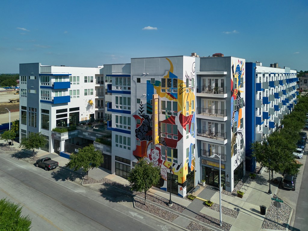 a large building with a colorful mural on the side of it