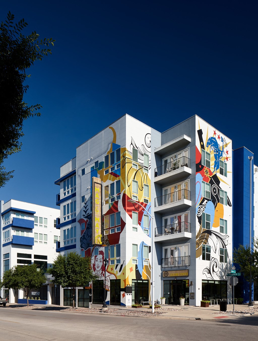 a building with graffiti on it on a city street