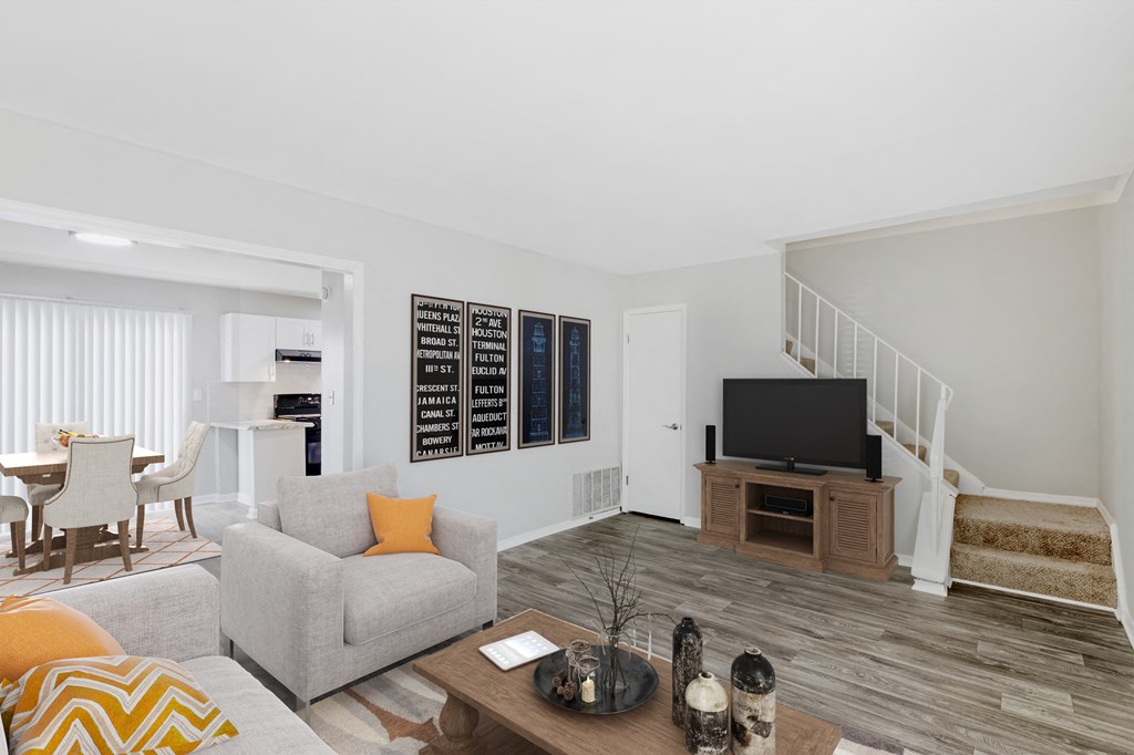 a living room with a couch and a tv