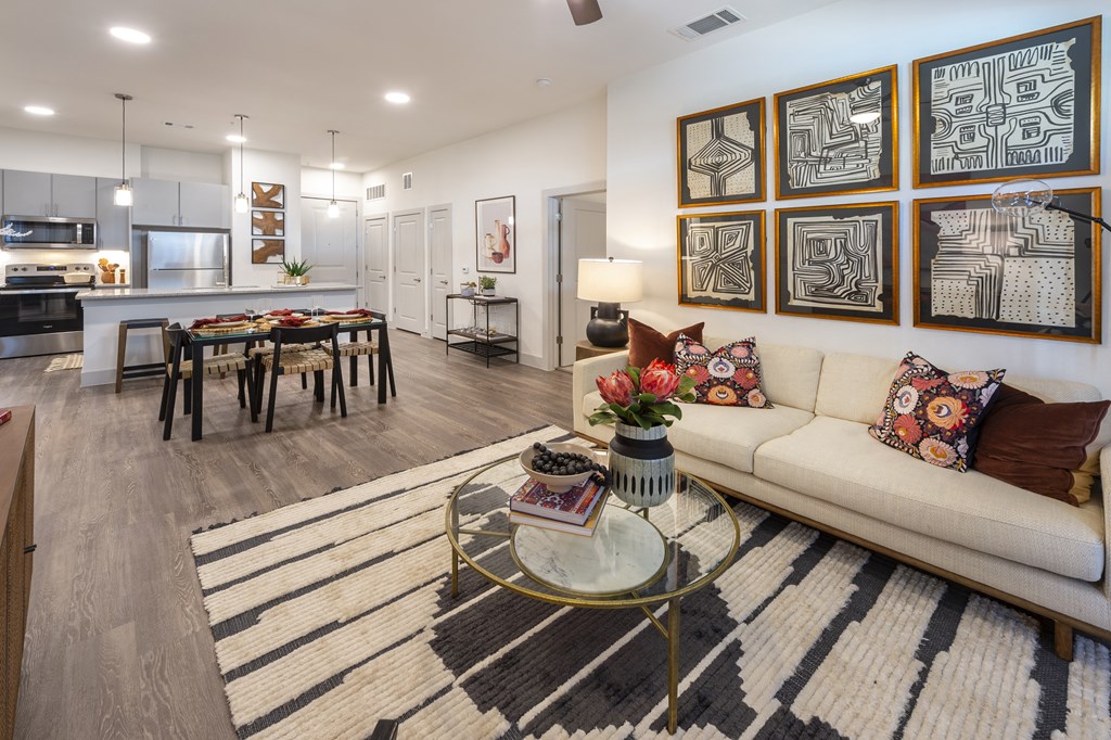 a living room with a couch and a table