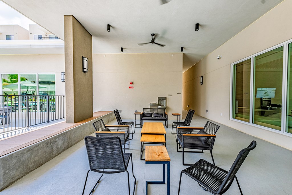 A patio with a table and chairs is shown.