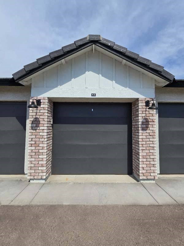 a garage door on the side of a house