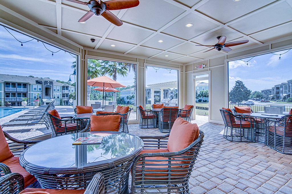 A patio with a table and chairs is shown.