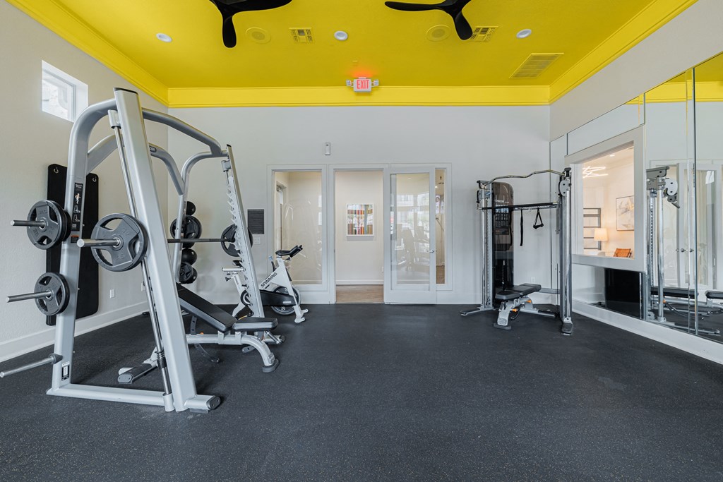 the gym at the heights at harpers preserve apartments
