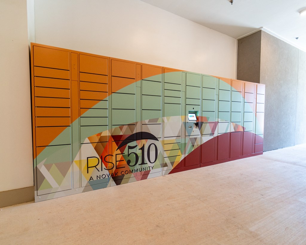 A wall with a mural that says Rise 510.