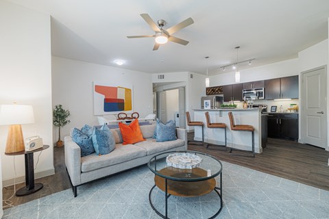 a living room with a couch and a coffee table