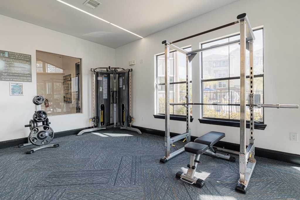 the gym at the flats at big tex apartments