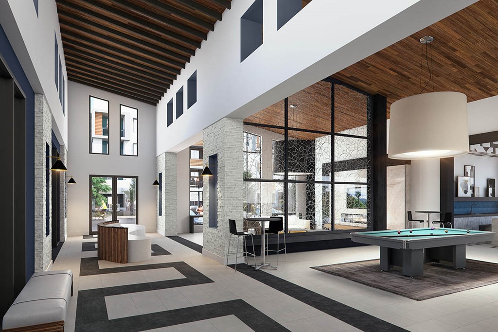 A modern living room with a pool table and a bar area.
