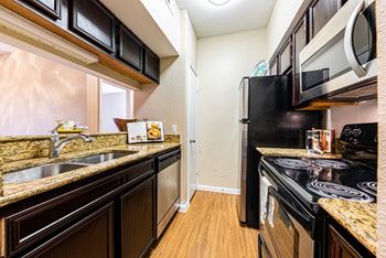 kitchen with stainless steel appliances in austin texas apartments