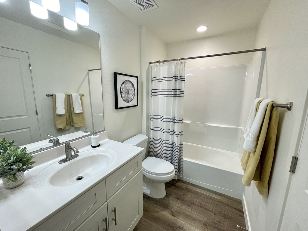 the residence on lamar apartment bathroom with shower sink and toilet