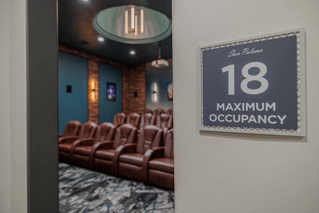 a room with a sign that says 18 maximum occupancy