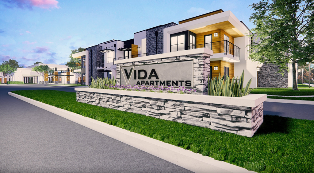 a rendering of the vida apartments sign in front of the building