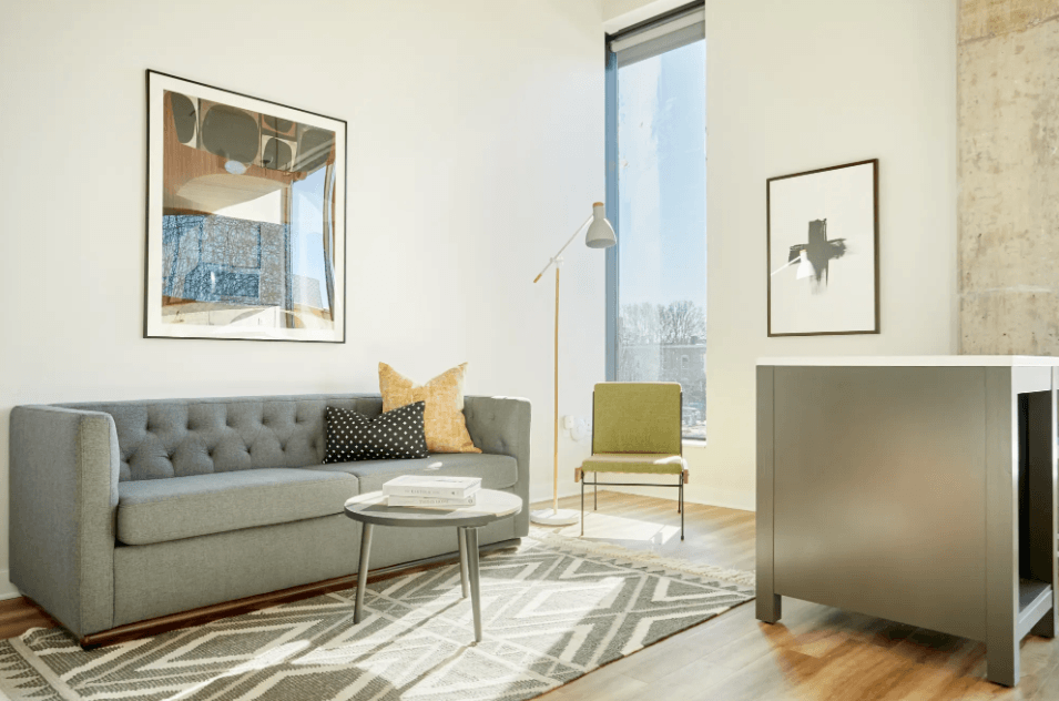 a living room with a couch and a coffee table