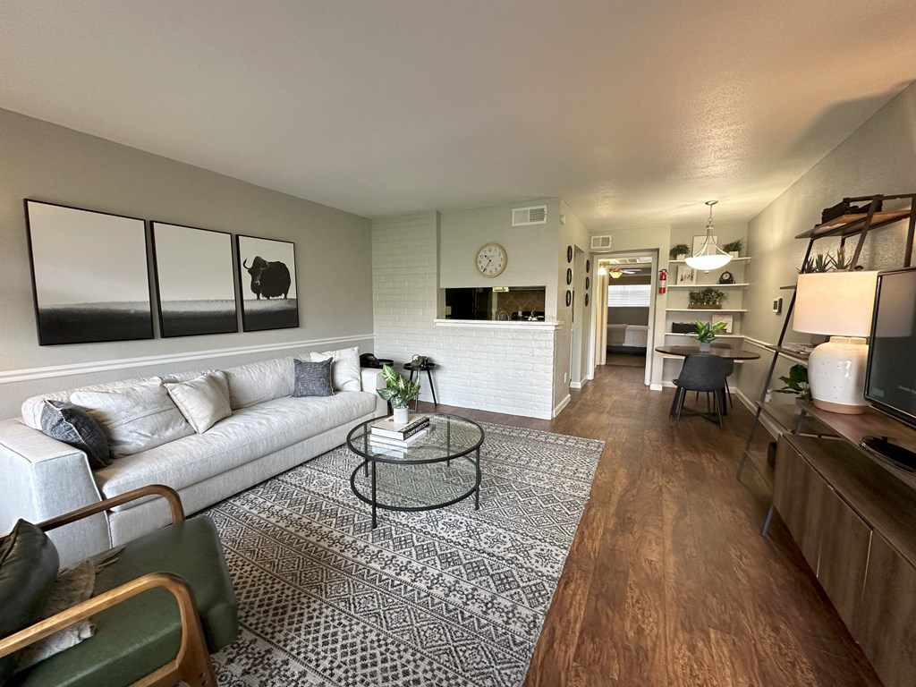 a living room with a couch and a table