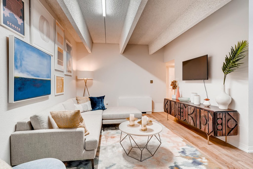 a living room with couches and a table