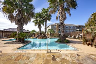 take a dip in the resort style pool