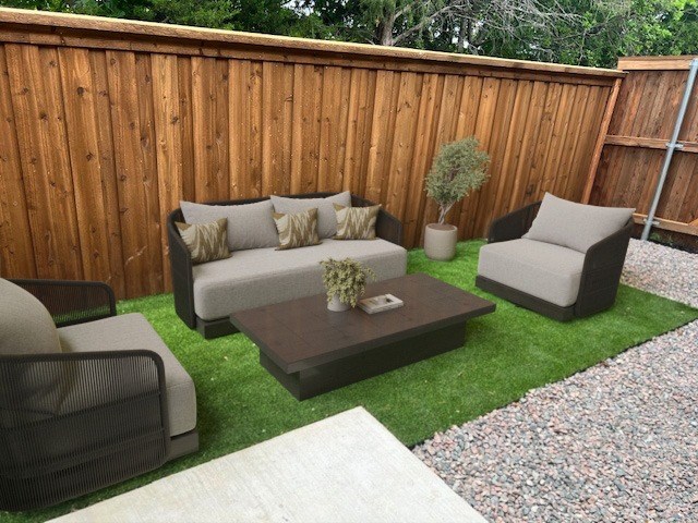 A patio with a couch, chairs, and a coffee table.