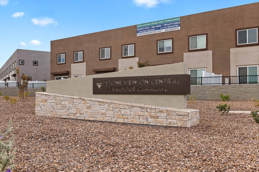 a large building with a sign in front of it