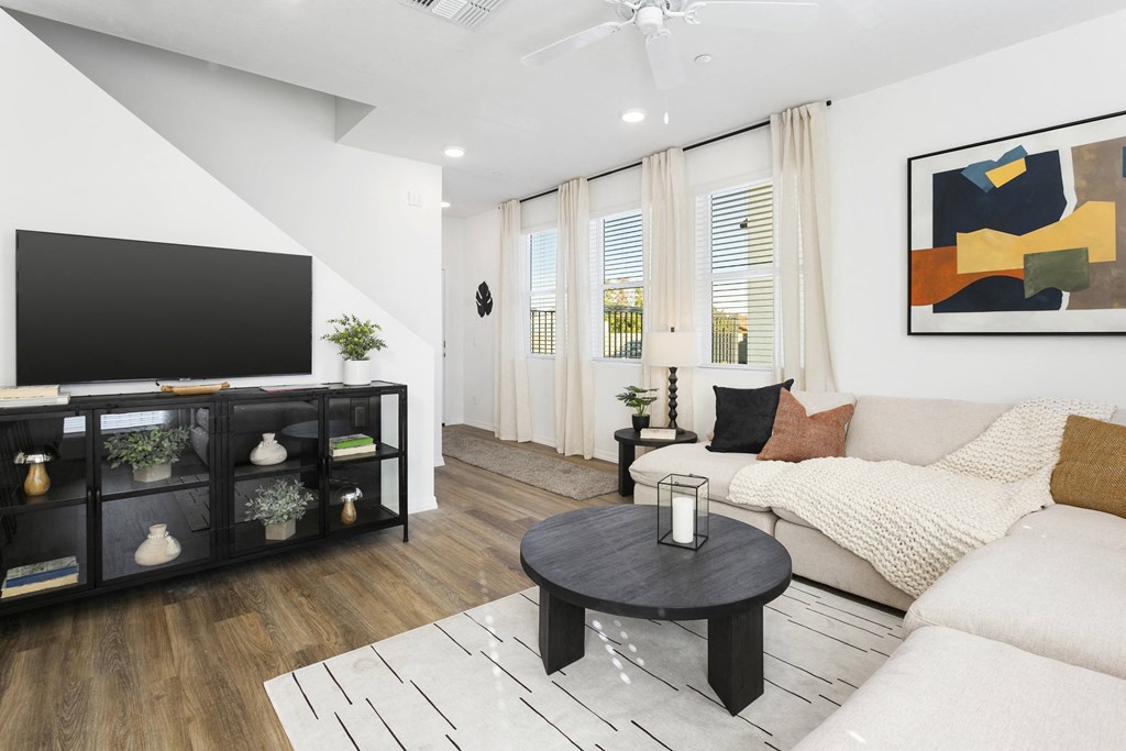 a living room with a couch and a coffee table