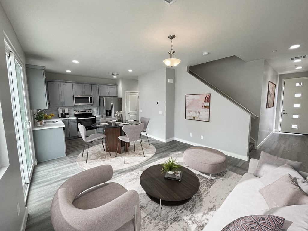 a living room and kitchen in a model home