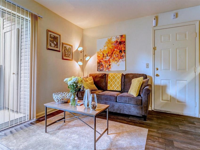 a living room with a couch and a table