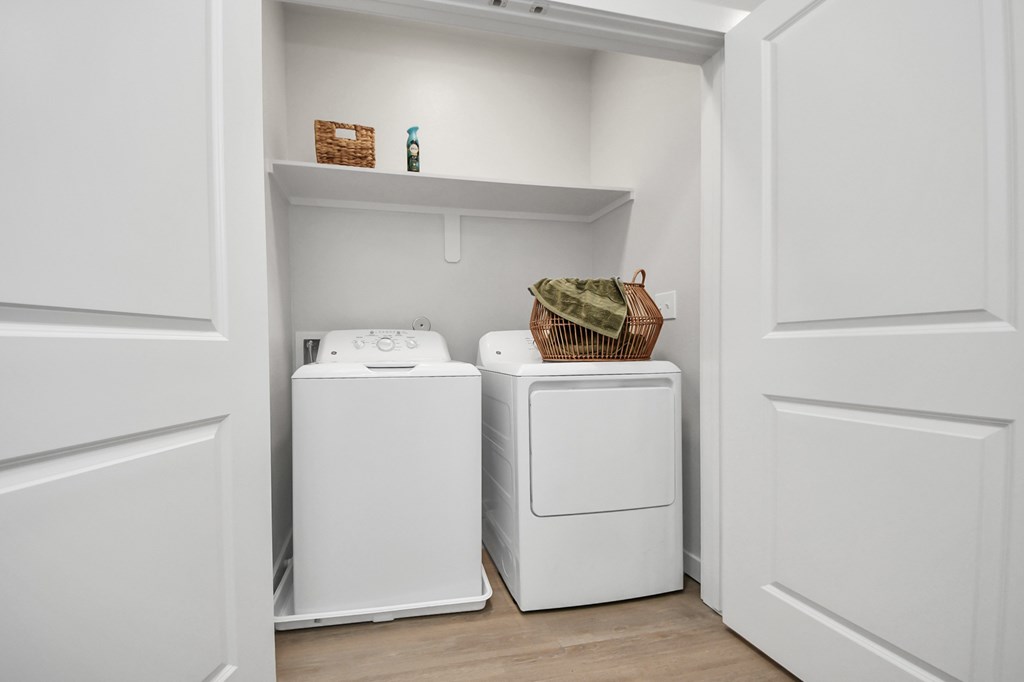 A laundry room with a washer and dryer.