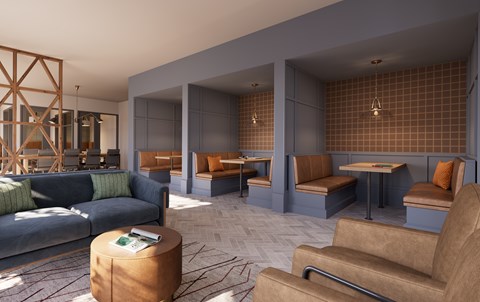 A modern living room with a blue couch, brown armchair, and a wooden coffee table.