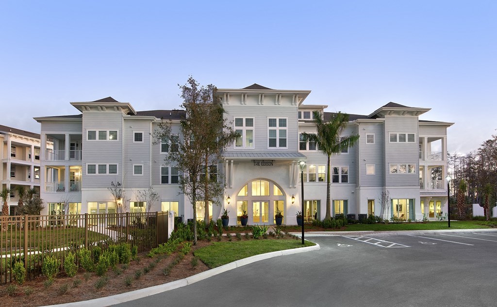 a large building with a street in front of it