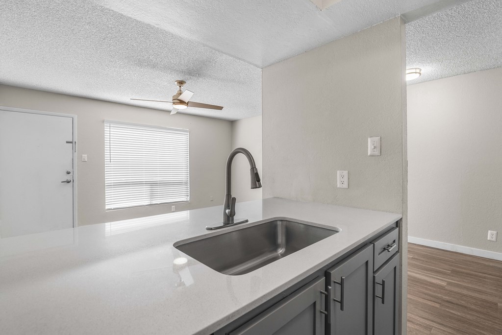 the kitchen of our studio apartment is clean and ready to use