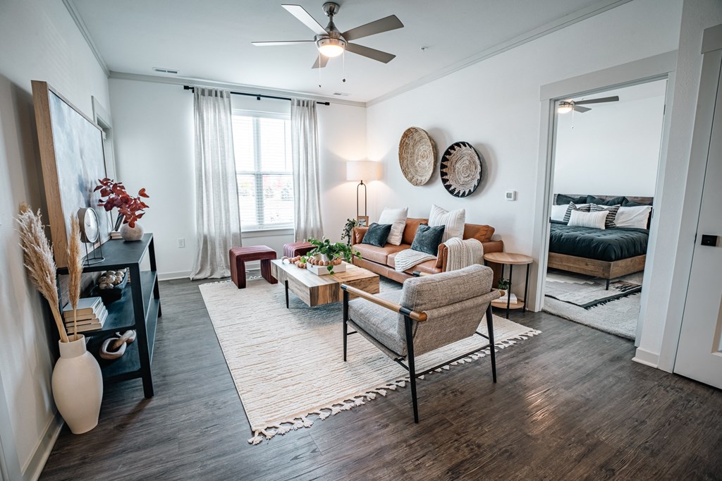 living area looking into primary bedroom