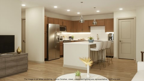 A modern kitchen with a white island and stainless steel appliances.